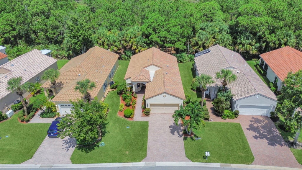 Photo of 312 NW Alana Avenue, Port Saint Lucie, FL 34986 (MLS # R11112826)