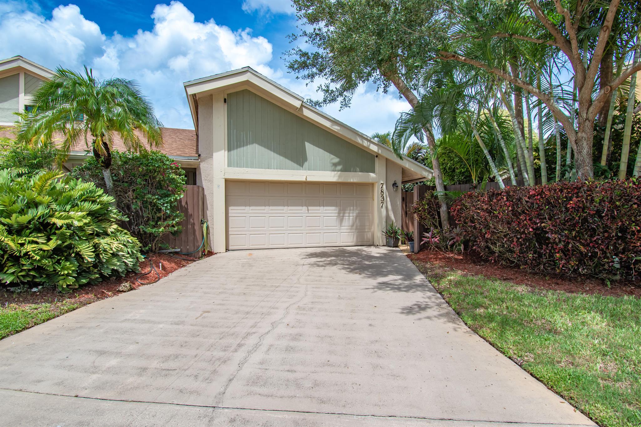 Fabulous 3-bedroom, two-bath villa perfectly situated on a quiet cul-de-sac in the prime Central Boca Community Of Sierra Del Mar W.Renovated to perfection, Featuring soaring ceilings, an open-concept floor plan, abundant natural light enhanced by skylights and LED lighting.The chef's kitchen boasts quartzite countertops, custom two-tone cabinetry, stainless steel appliances, a glass-top range, and a spacious island with seating. & luxury vinyl floors, Open living & dining flow seamlessly and are accented by a contemporary fireplace with glass tile surround and custom built-ins.The oversized primary suite offers dual closets, a linen closet, and a luxurious newly renovated bath with a soaking tub, frameless glass shower, and designer finishes. Two additional bedrooms provide flexibility