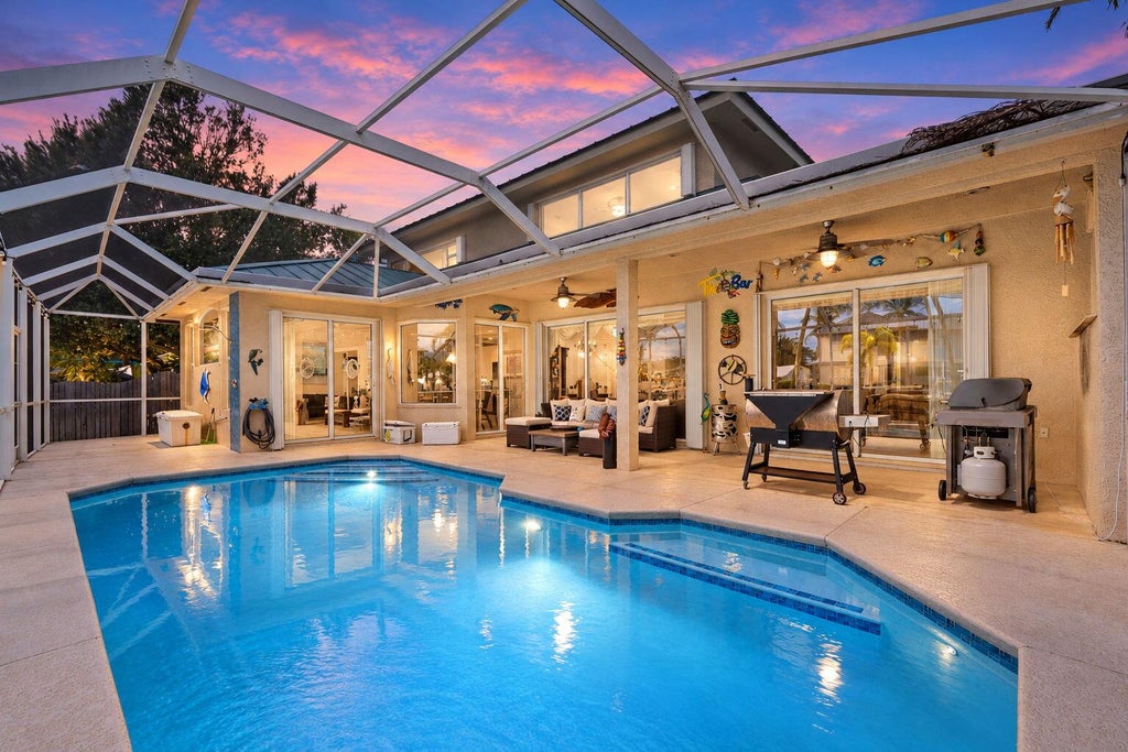 Photo of 1424 SW SEAGULL Way, Palm City, FL 34990 (MLS # B26091129)