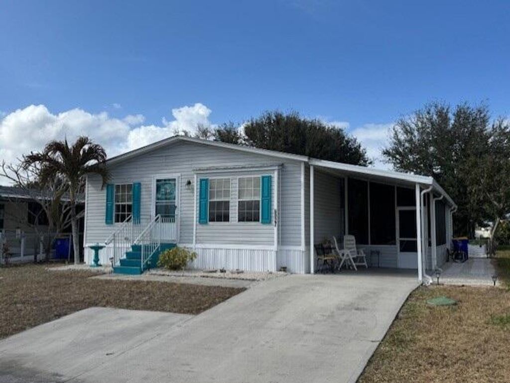 Photo of 6927 SE Delegate Street, Hobe Sound, FL 33455 (MLS # R11164573)
