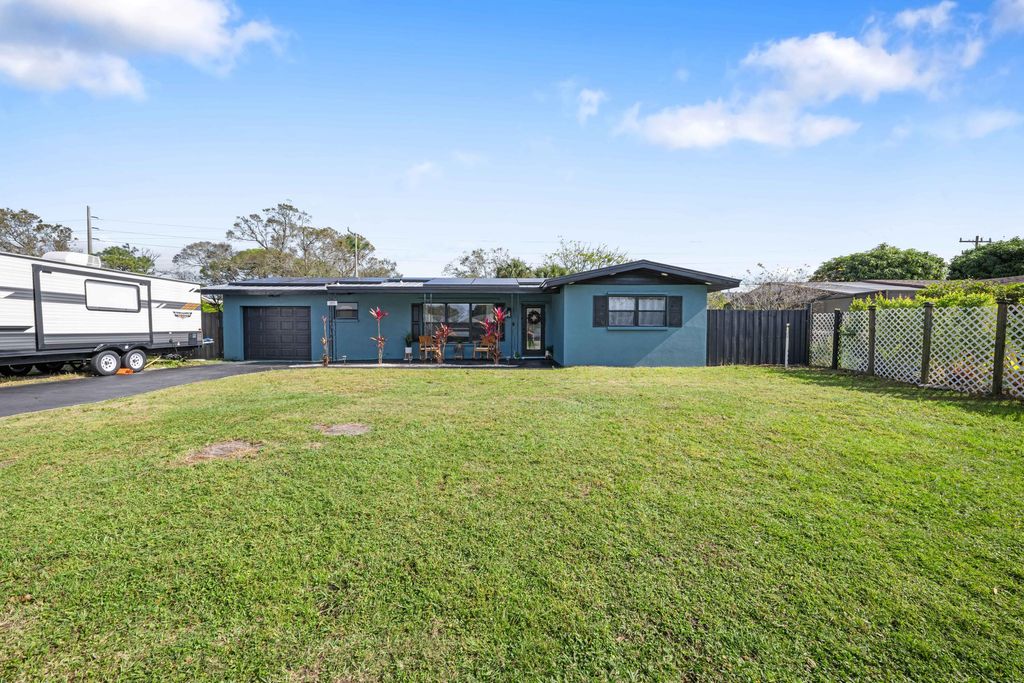 Photo of 205 E Arbor Avenue, Port St Lucie, FL 34952 (MLS # R10859844)