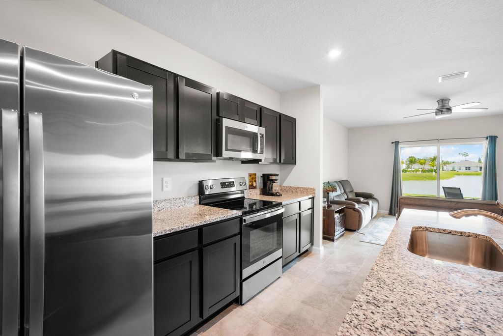 Photo of 834 Persimmon Place, Fort Pierce, FL 34981 (MLS # R11084886)