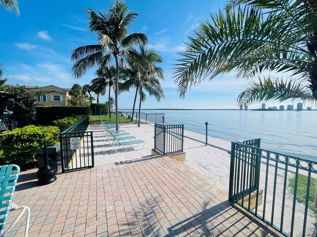 Photo of 1130 Lake Shore Drive #102, Lake Park, FL 33403 (MLS # R10902075)