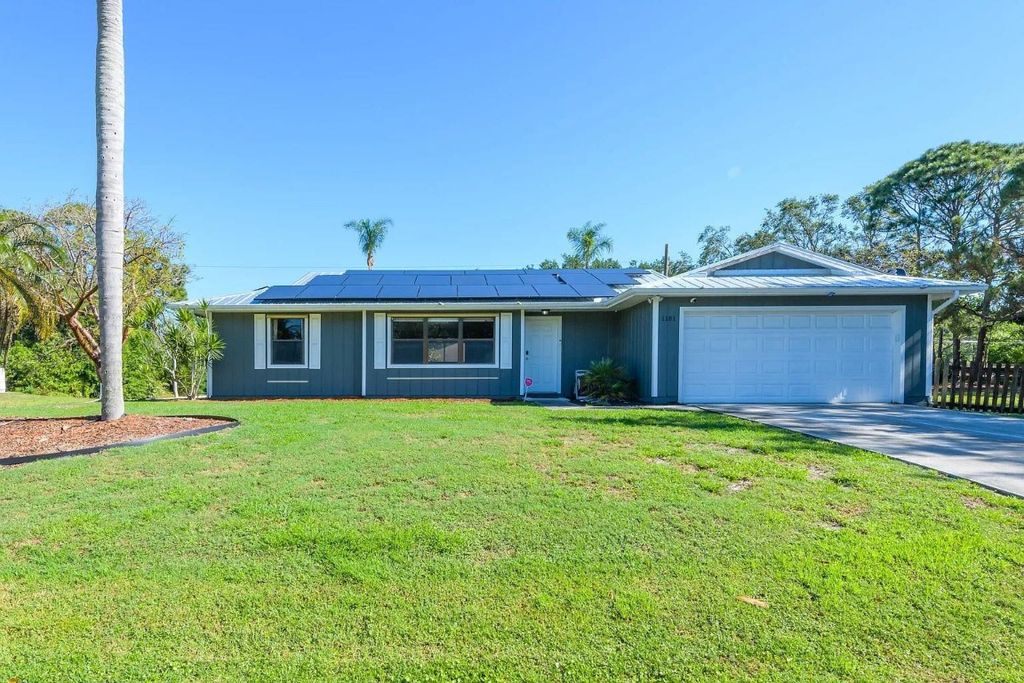 Photo of 1181 SW Goodman Avenue, Port Saint Lucie, FL 34953 (MLS # F10511709)
