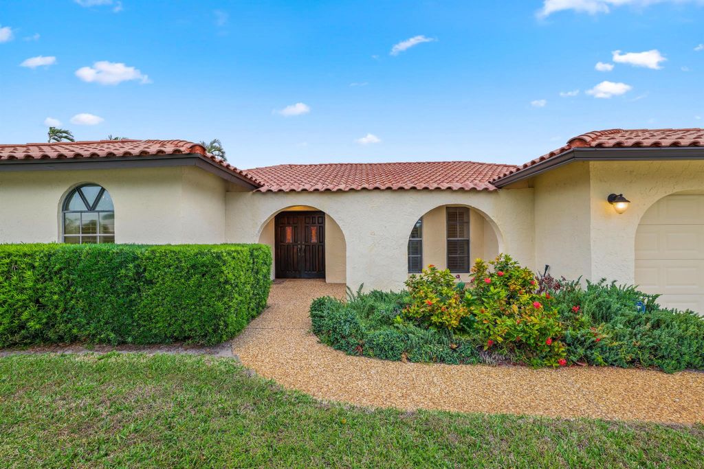 Photo of 631 Carriage Hill Lane, Boca Raton, FL 33486 (MLS # R10936096)