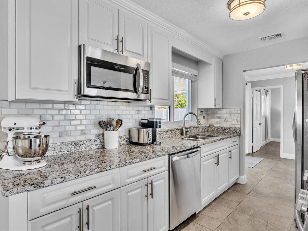 Photo of 3885 Bluebell Street, Palm Beach Gardens, FL 33410 (MLS # R11082742)