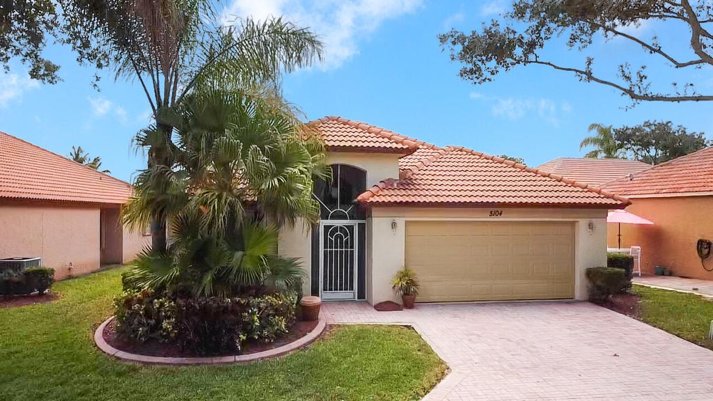 Photo of 5104 Elpine Way, Riviera Beach, FL 33418 (MLS # R10801732)