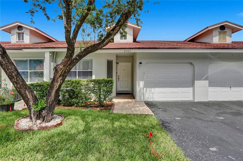 Photo of 6764 N Pine Island Rd, Tamarac, FL 33321 (MLS # F10335129)