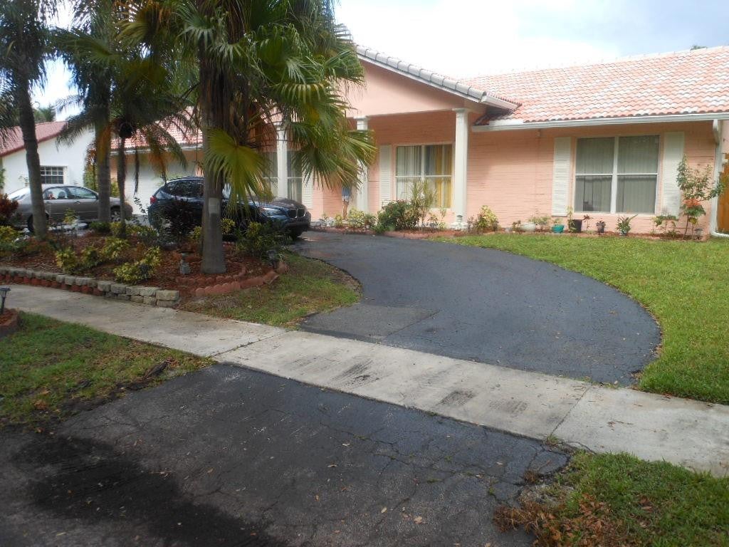 Photo of 1940 SW 51ST Terrace, Plantation, FL 33317 (MLS # B26092857)