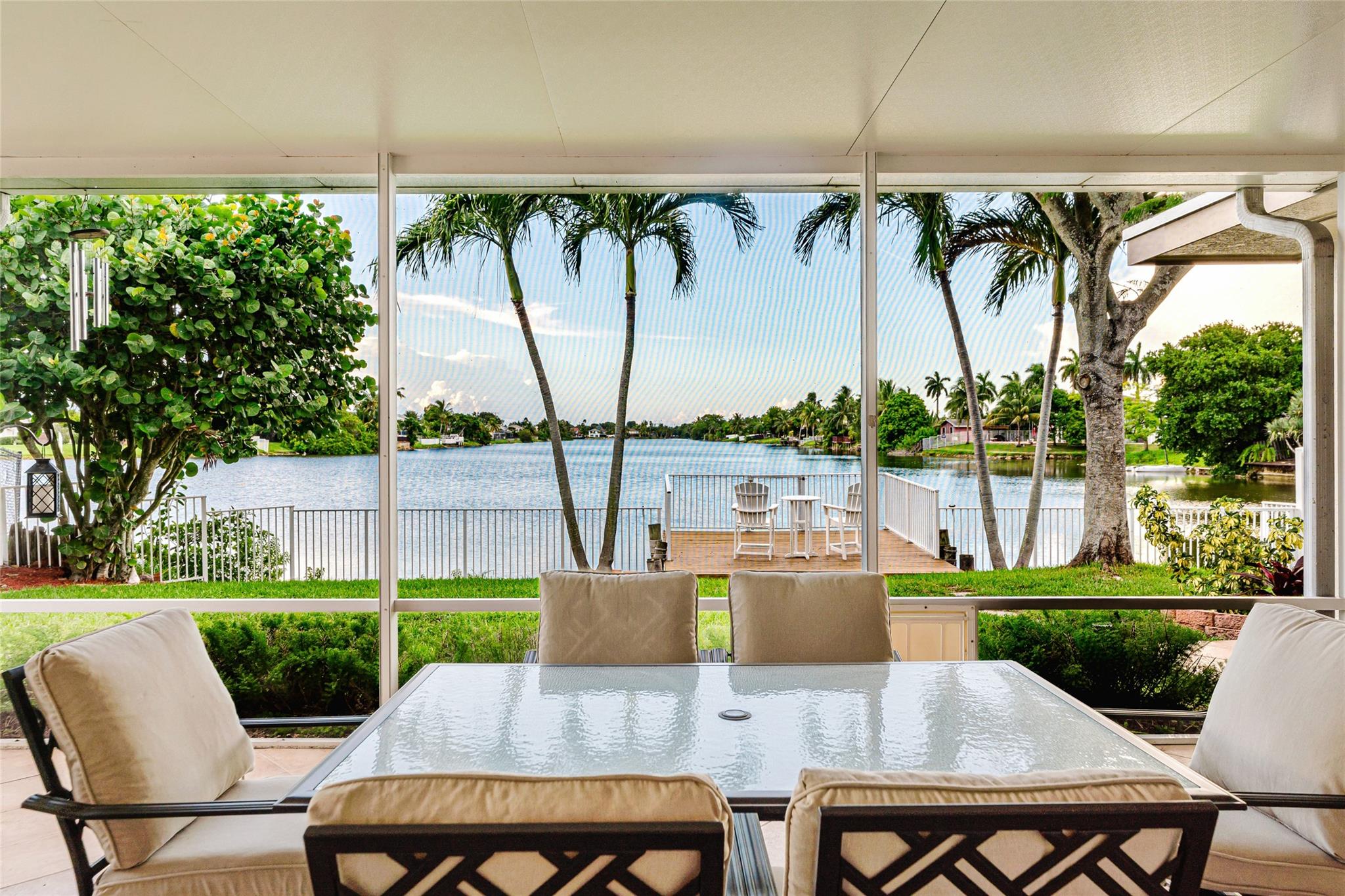 NO HOA. Amazing and expansive long lake views from all central rooms within this charming house located in West Sunrise with a split bedroom floor plan. The kitchen is remodeled with gas range and double ovens, situated between the living and family room giving it an open concept and flow. House has impact windows throughout and glass impact doors leading to a covered screened in patio and breathtaking lake view with large deck. Hurricane rated garage and front door. Stamped concrete driveway. Conveniently located near Welleby Park with children's water play area and dog park, as well as Hiatus Greenway for biking, running and skating. Close to the Sawgrass Mall,Amerant Bank Arena (Florida Panthers Stadium.) Minutes to I-75 for commuting, and Sunrise Pool Aquatic Complex