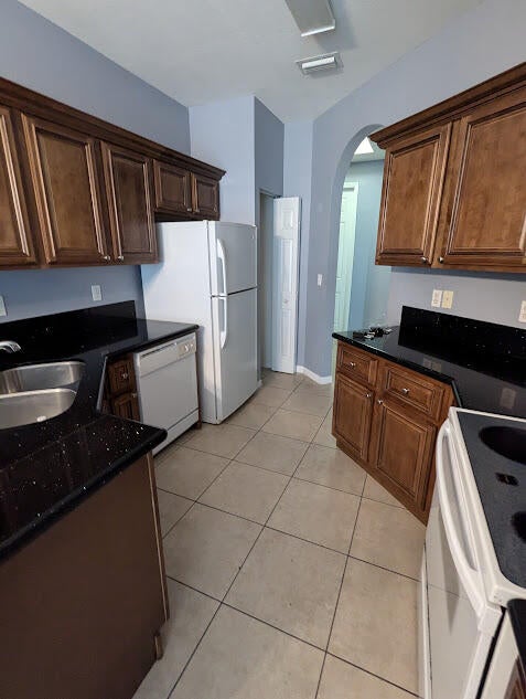 Photo of 999 Pipers Cay Drive, West Palm Beach, FL 33415 (MLS # B26066137)