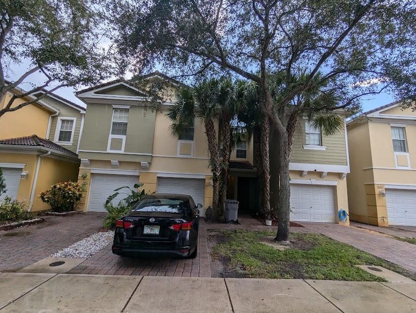 Photo of 999 Pipers Cay Drive, West Palm Beach, FL 33415 (MLS # B26066137)
