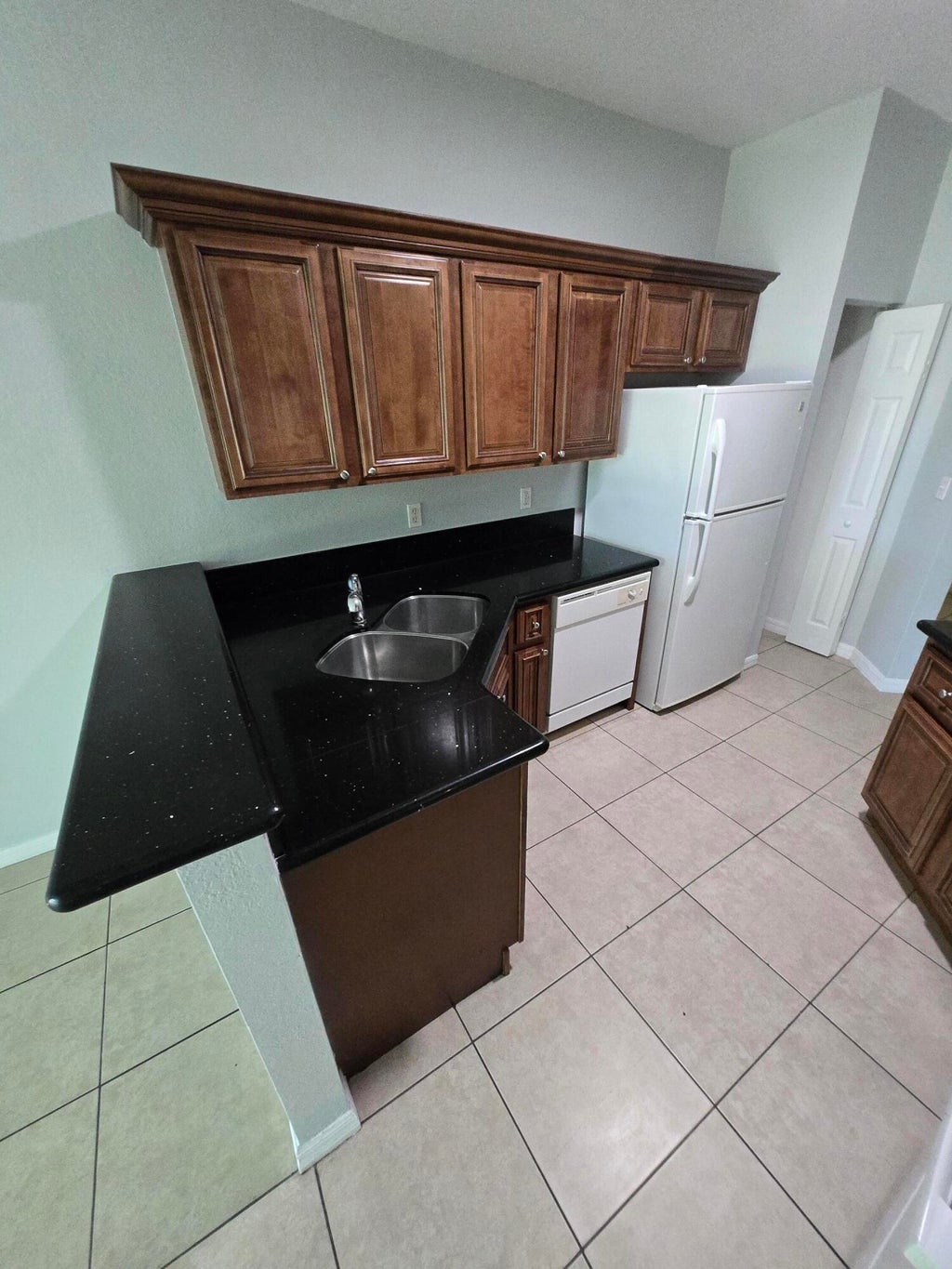 Photo of 999 Pipers Cay Drive, West Palm Beach, FL 33415 (MLS # B26066137)