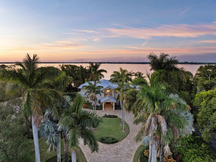Seize the opportunity to own one of the largest lots on prestigious Riverside Drive in Stuart, Florida. This unique 1.16-acre property features 150 feet of deep water frontage with a private dock & boat lift east of the train bridge, designed to accommodate a large boat. The property's northern exposure is perfect for enjoying breathtaking sunsets and watching fireworks on the 4th of July. The main residence boasts a superb floor plan with over 4,583 square feet of space that includes expansive living areas and seamless indoor-outdoor living, ideal for entertaining & relaxation. Located just minutes from vibrant downtown Stuart, known for its shops and beaches, this home combines luxury with an unbeatable location, offering a once-in-a-lifetime chance to secure your dream waterfront home.
