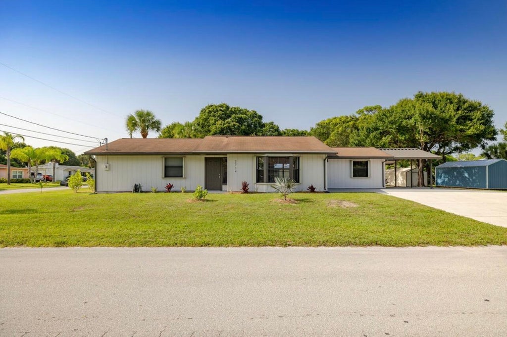 Photo of 2714 Rhode Island Avenue, Fort Pierce, FL 34947 (MLS # B26069434)
