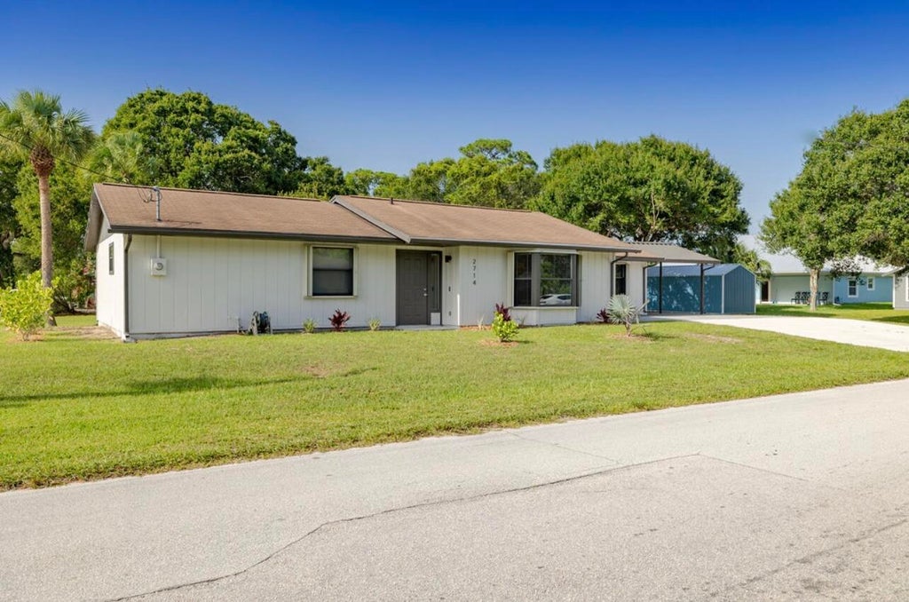 Photo of 2714 Rhode Island Avenue, Fort Pierce, FL 34947 (MLS # B26069434)