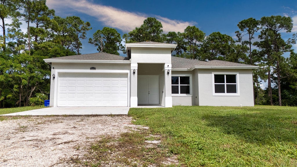 Photo of 16569 77th Lane N, Loxahatchee, FL 33470 (MLS # B26093456)