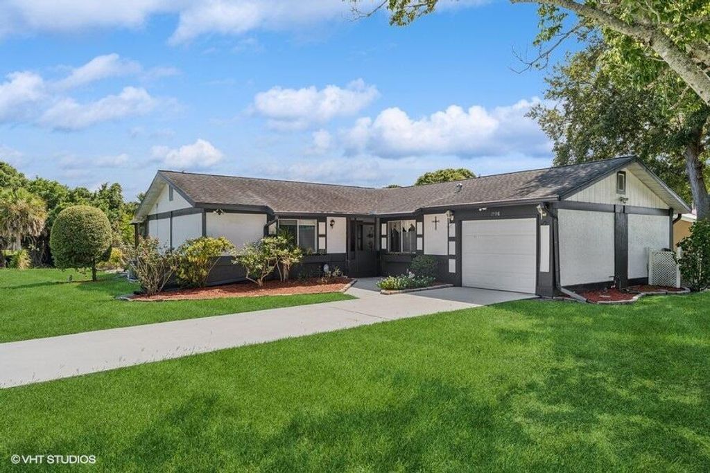 Photo of 1998 SE Morningside Boulevard, Port Saint Lucie, FL 34952 (MLS # R11108287)