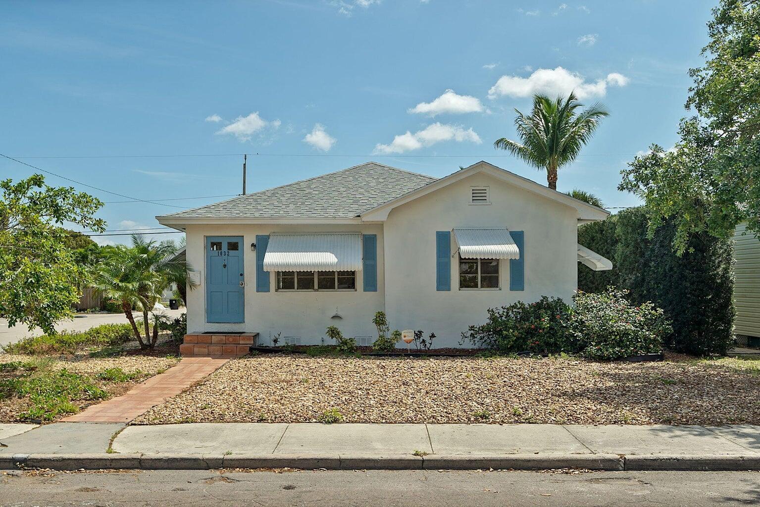 Two Mid Century single family detached homes on one lot. The primary residence at 1032 N. J Street is 2 bedrooms and 1 bath, with hardwood floors, central a/c, a spacious living room, eat-in kitchen and an enclosed porch. Complete with washer/dryer, small yard and off street parking. 711 111th Ave. N. is additional 1 bedroom 1 bath single family detached home, currently leased for $2000 per month. Boasting hardwood floors, central a/c, spacious living room, eat-in kitchen, large bedroom and an updated bathroom. With its own carport, washer & dryer, storage and a private backyard space. Perfect for extra income, extended family or an office. Both units are CBS, have separate electric meters and water heaters. Minutes from downtown Lake Worth and just over the bridge to the beach.