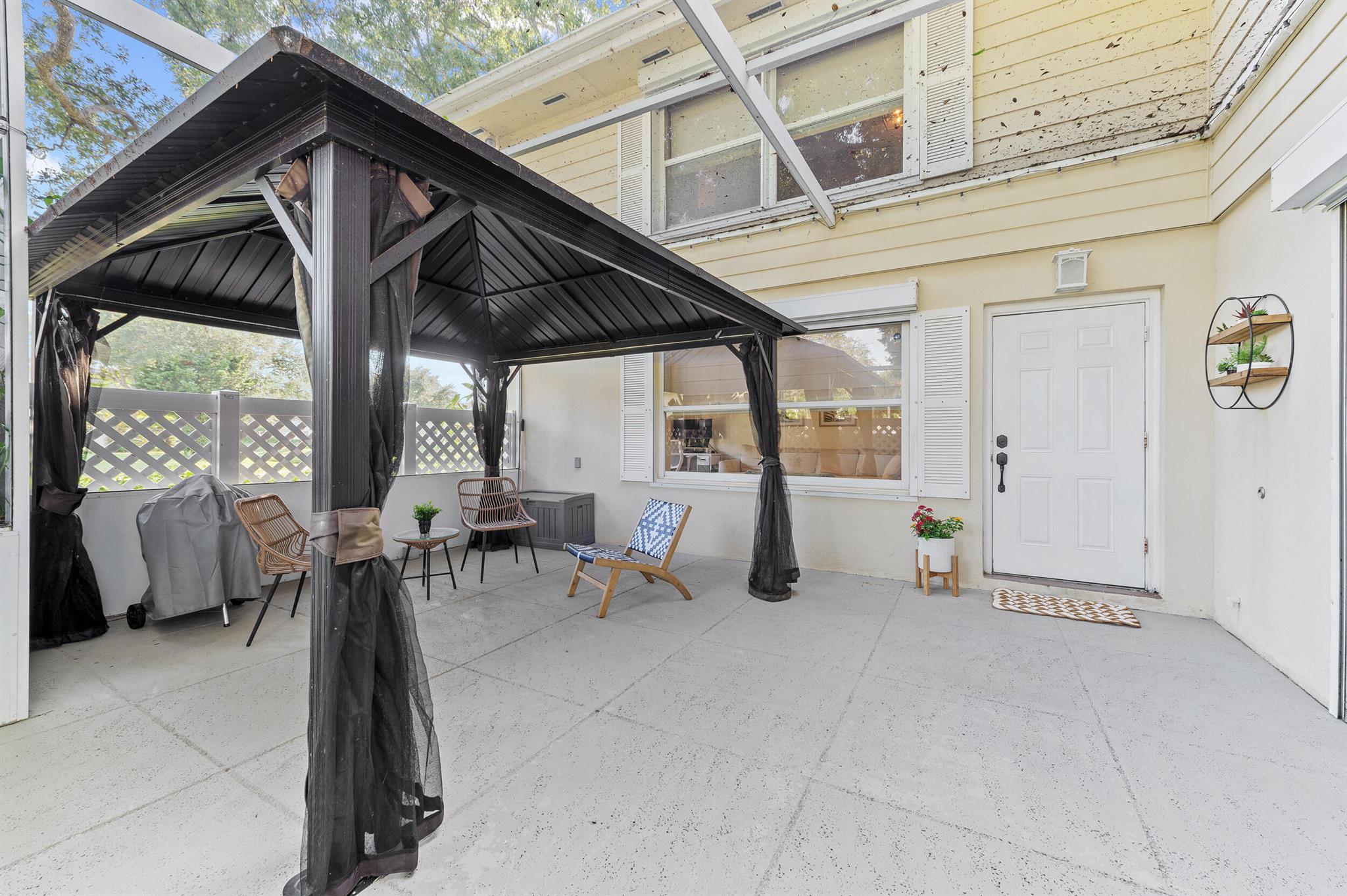 This 2-bedroom, 2.5-bath townhome offers spacious living, stylish updates, and a private fenced courtyard perfect for entertaining or relaxing under the Florida sun.Don't miss this rare opportunity to own in the highly sought-after community of Lake Clarke Shoresa"where quiet streets, friendly neighbors, and a prime location meet. Enjoy beautiful lake views right from your home, a recently replaced A/C (2022) for peace of mind. Centrally located with easy access to I-95, downtown West Palm Beach, beaches, and top-rated schools, this home delivers unbeatable value in a well-established neighborhood.