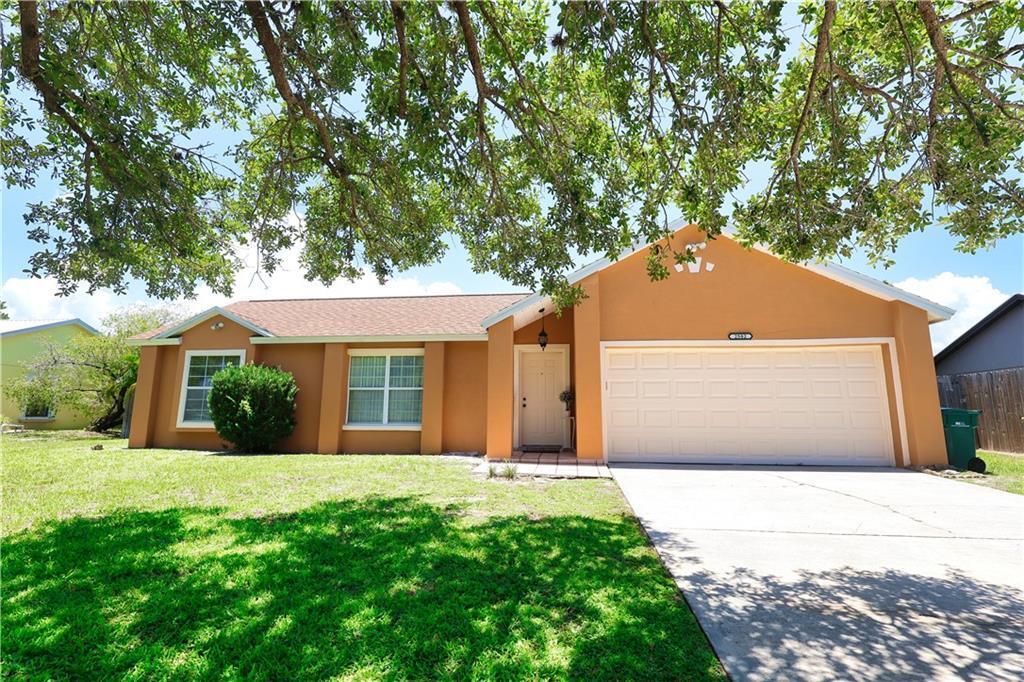 Beautiful Home Look NO More 3/2 1468 Square Feet under Air. Tile throughout.
