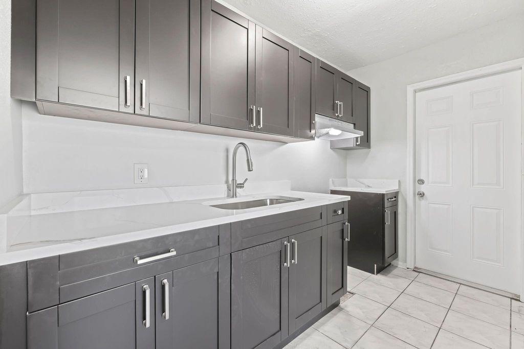 Photo of 1409 NW 7th Avenue, Fort Lauderdale, FL 33311 (MLS # B26025526)
