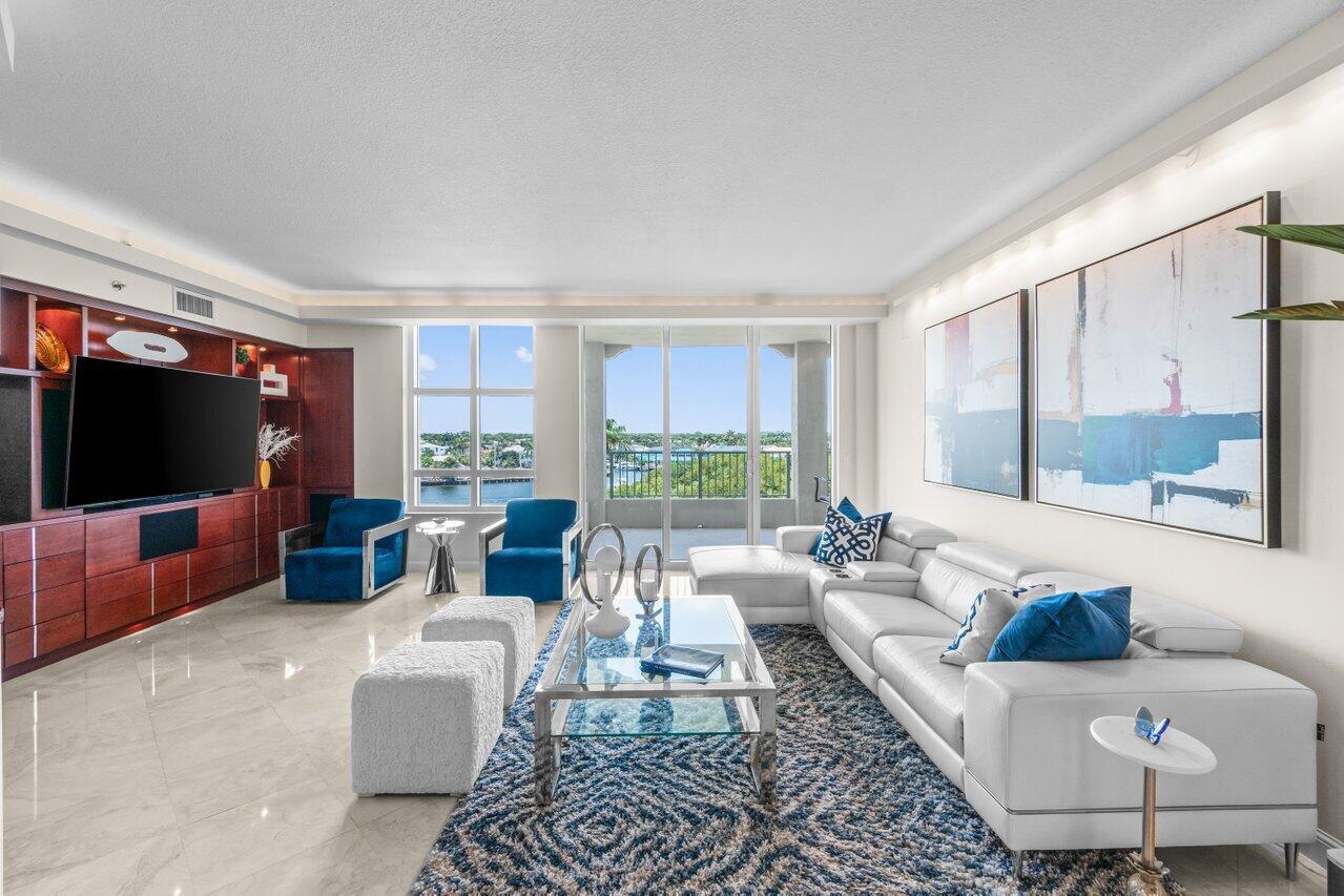 SWEEPING INTRACOASTAL VIEWS FROM THE WEST BALCONY & PARTIAL OCEAN, LUSH LANDSCAPING & RESORT STYLE AMENITES VIEW FROM THE EAST BALCONY. RENOVATED 2 BEDROOM 2 & HALF BATH SPLIT BEDROOM PLAN WITH AN OPEN KITCHEN CONCEPT PERFECT FOR ENTERTAINING! 9 FT CEILINGS, NEWER APPLIANCES, WASHER /DRYER & A/C. CUSTOM BUILT-INS THROUGHOUT! NEUTRAL BONE MARBLE FLOORS IN MAIN AREAS! IMMACULATE CONDITION! THE ELEVATOR TAKES YOU TO YOUR PRIVATE FOYER & DOUBLE DOOR ENTRANCE! TOSCANA OFFERS 3 RESORT STYLE POOLS,VALET SERVICE, TENNIS COURTS, FITNESS, PARTY & CARD ROOMS, 24 HOUR SECURITY GATE & CONCIERGE SERVICE, A PRIVATE BEACH CLUB WITH TOWELS, CHAIRS, A BATHROOM, LOCKERS & A BBQ AREA WITH OUTDOOR DINING! THERE ARE SOCIAL EVENTS & PARTIES TOO!
