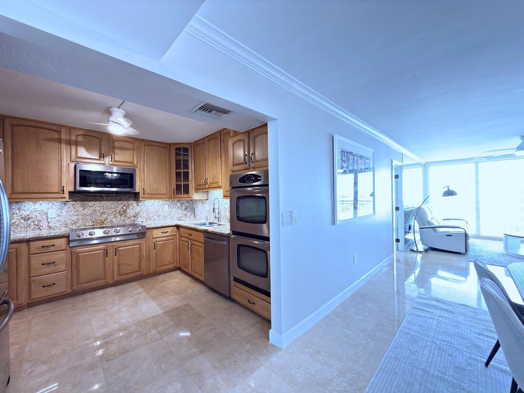 Photo of 3546 S Ocean Boulevard #822, South Palm Beach, FL 33480 (MLS # B26059188)