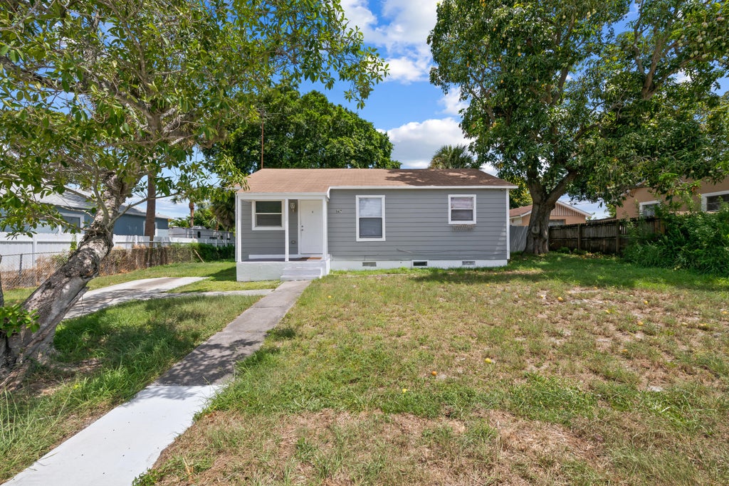 Photo of 947 43RD Street, West Palm Beach, FL 33407 (MLS # B26056028)