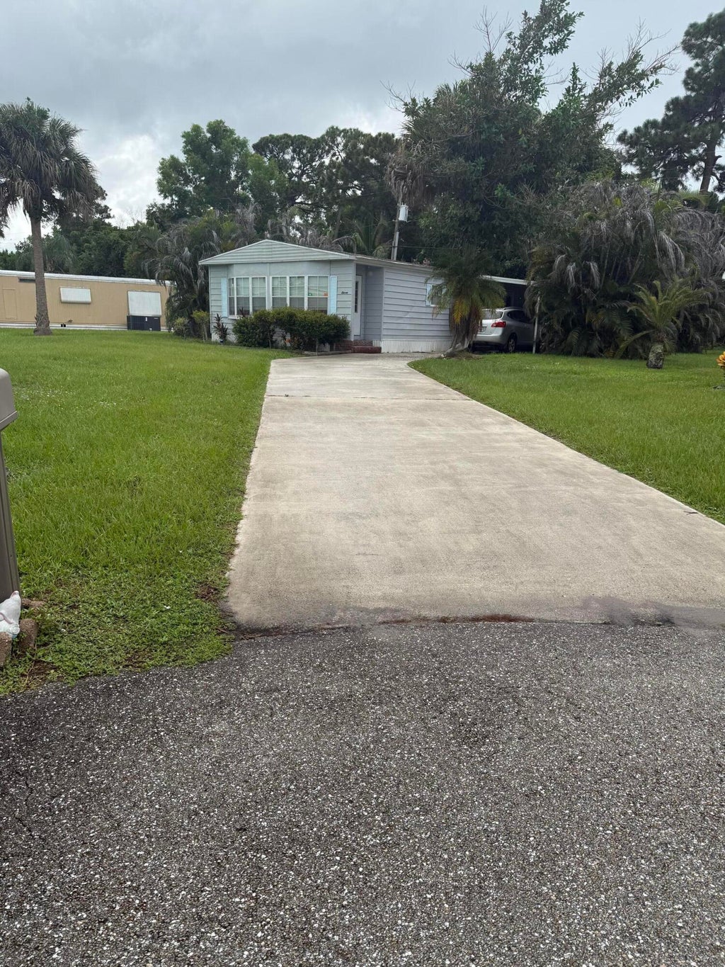 Photo of 11 SE La Mesa LN, Port Saint Lucie, FL 34952 (MLS # B26070121)