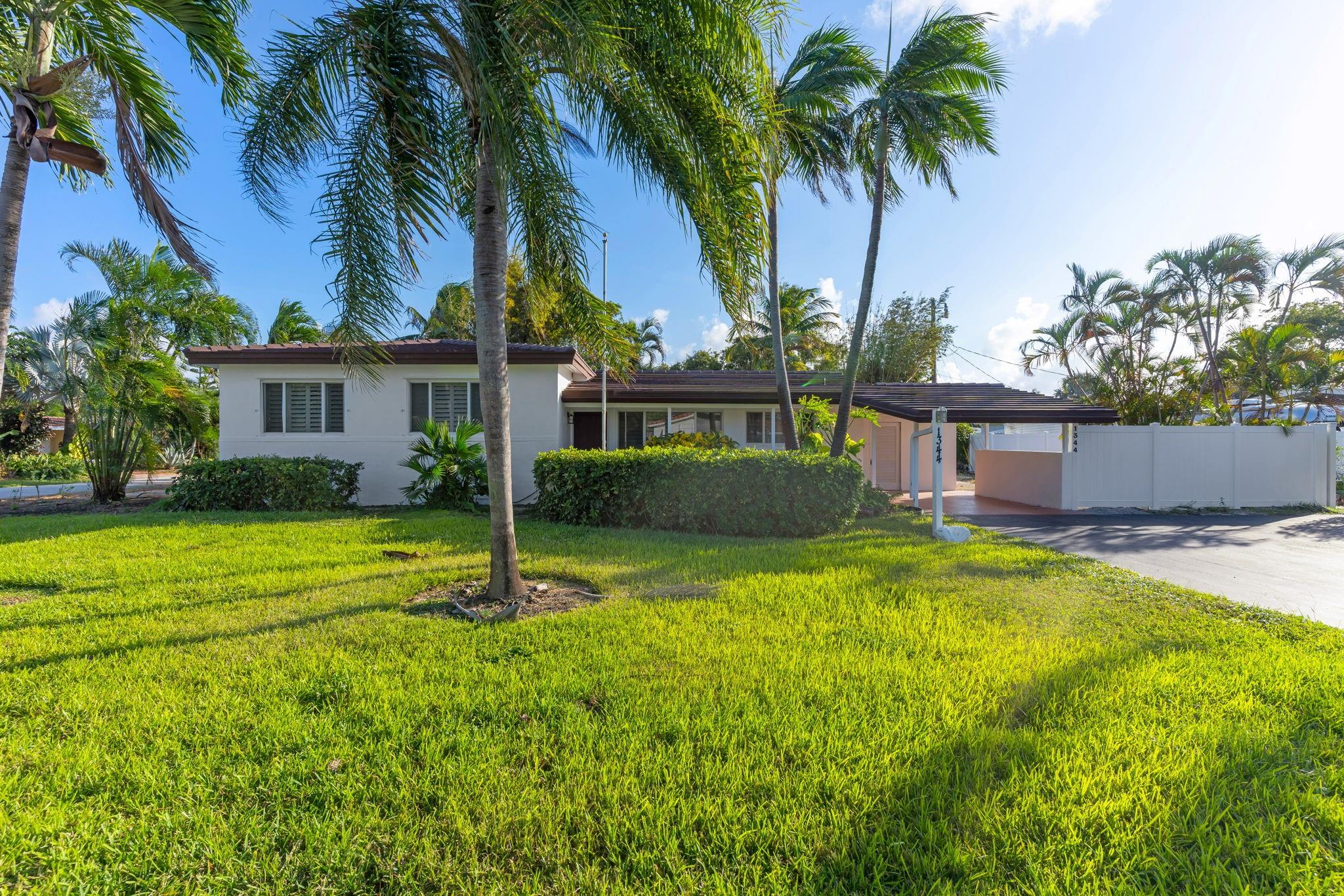 This stunning 3-bedroom, 2-bathroom home in The Cove offers the ultimate blend of coastal charm and modern convenience. Located ideally between Lighthouse Point and Boca, this residence is just a short distance from the iconic Deerfield Beach Pier and a variety of waterfront dining options. Recently refurbished with meticulous attention to detail, this home features impact windows for added safety, a newer roof for peace of mind, and ample space to park a boat—ideal for those who love the water.