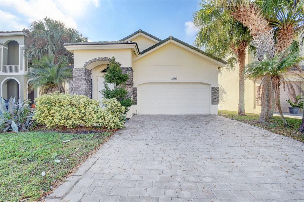 Photo of 4084 Coontie Court Ct, Lake Worth Beach, FL 33462 (MLS # R10763214)