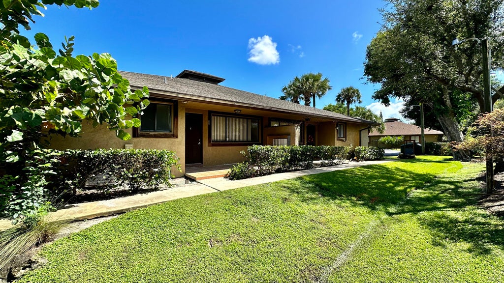 Photo of 3120 Collin Drive #Unit d, West Palm Beach, FL 33406 (MLS # B26092576)