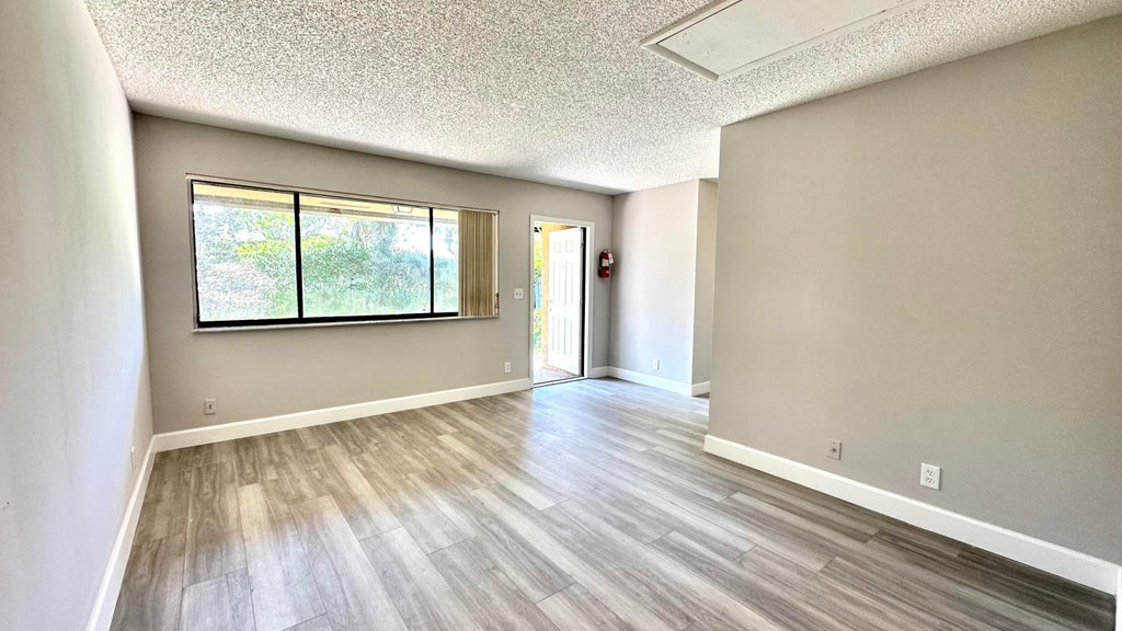 Photo of 3120 Collin Drive #Unit d, West Palm Beach, FL 33406 (MLS # B26092576)