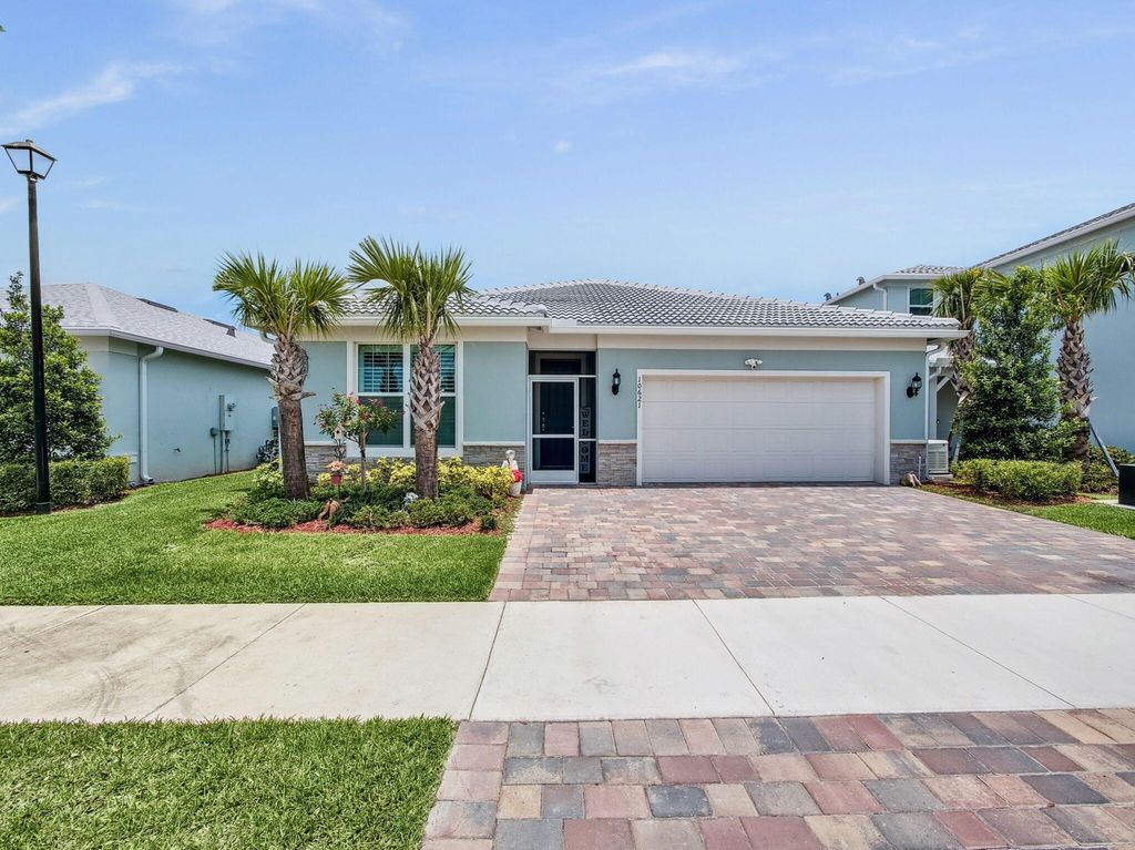 Photo of 10621 SW Morning Glory Drive, Port Saint Lucie, FL 34987 (MLS # R11093757)