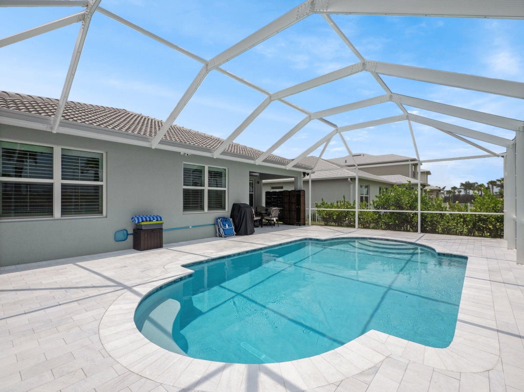 Photo of 10621 SW Morning Glory Drive, Port Saint Lucie, FL 34987 (MLS # R11093757)