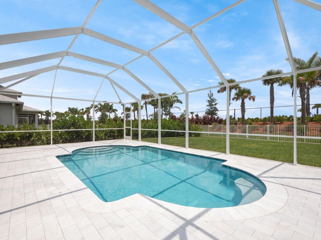Photo of 10621 SW Morning Glory Drive, Port Saint Lucie, FL 34987 (MLS # R11093757)