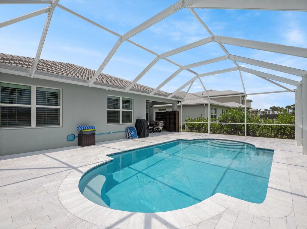 Photo of 10621 SW Morning Glory Drive, Port Saint Lucie, FL 34987 (MLS # R11093757)