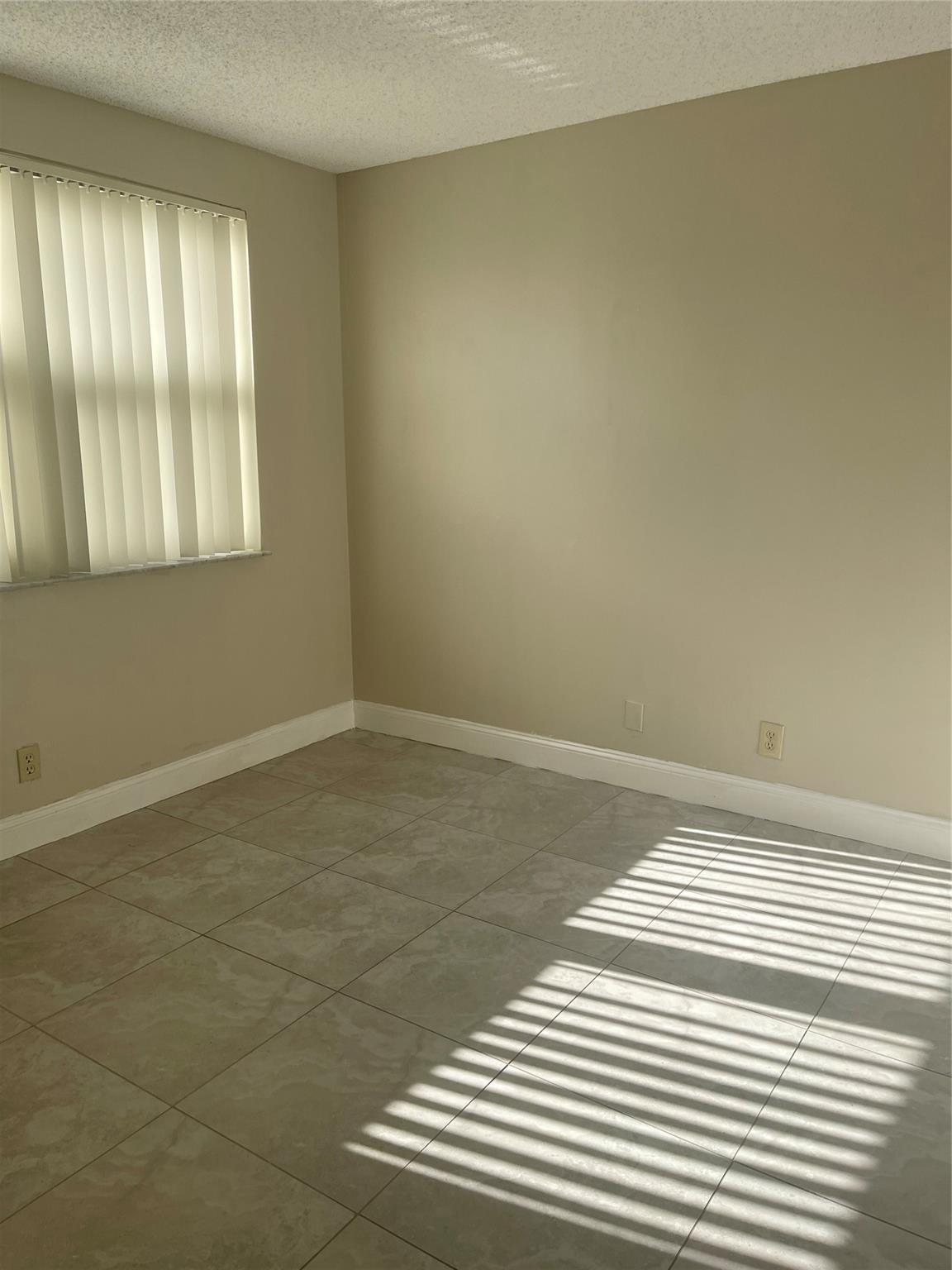 8801 Wiles Rd 208