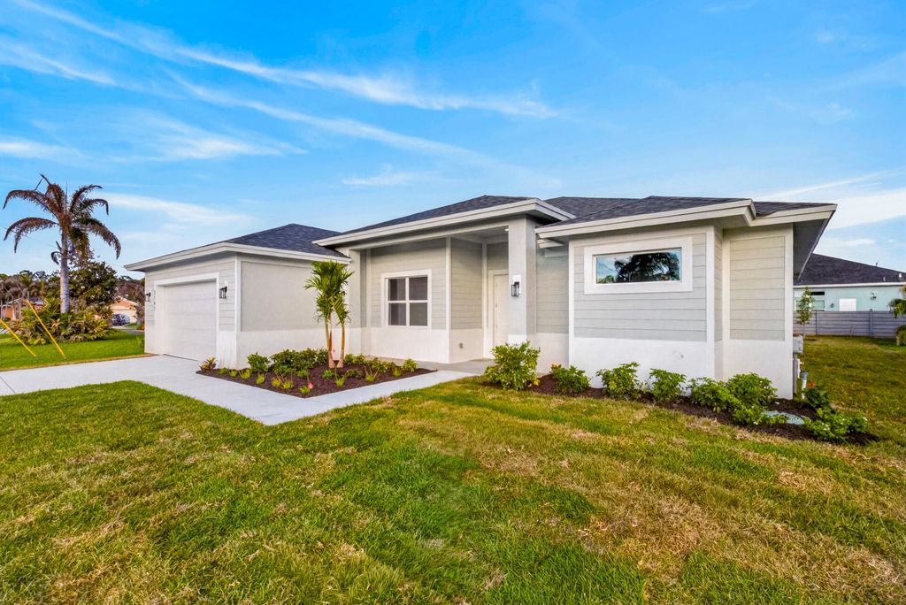 Photo of 5761 NW Cone Street, Port Saint Lucie, FL 34986 (MLS # R11154447)