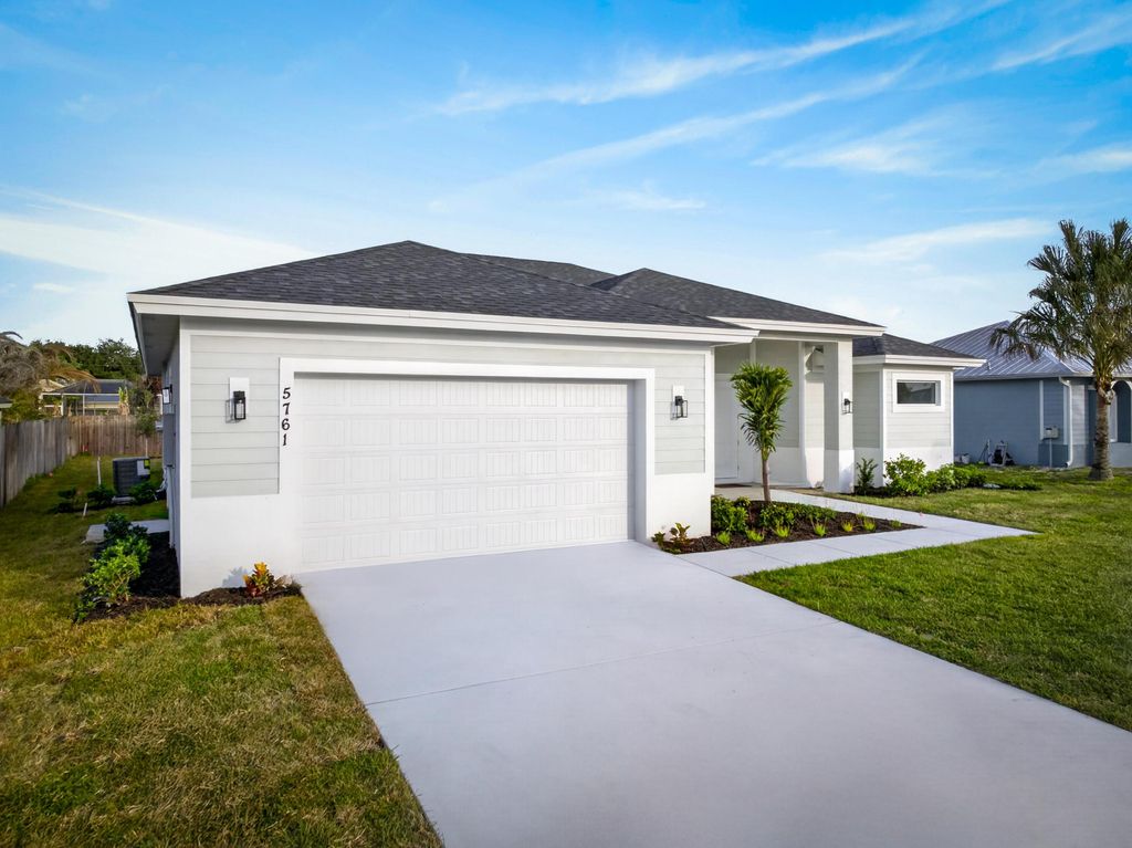Photo of 5761 NW Cone Street, Port Saint Lucie, FL 34986 (MLS # R11154447)