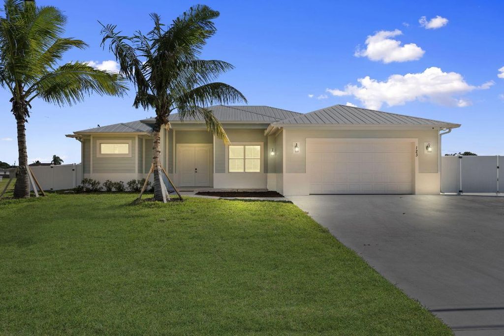 Photo of 5761 NW Cone Street, Port Saint Lucie, FL 34986 (MLS # R11154447)