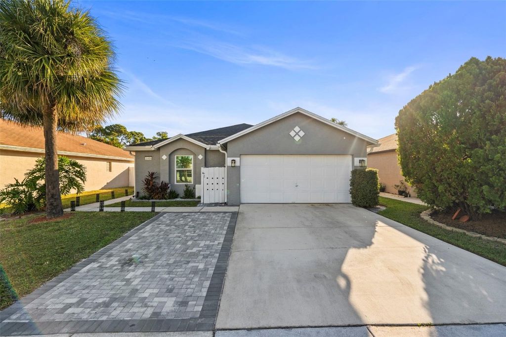 Photo of 1406 Red Apple Lane, West Palm Beach, FL 33415 (MLS # F10536252)