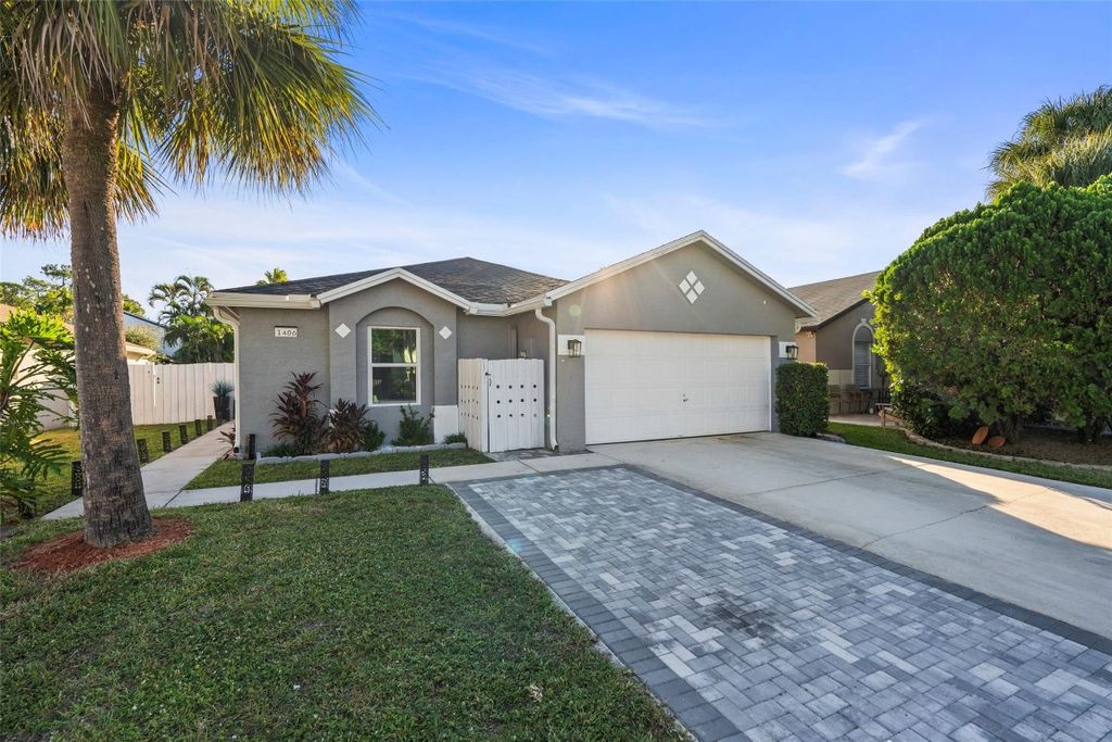 Photo of 1406 Red Apple Lane, West Palm Beach, FL 33415 (MLS # F10536252)