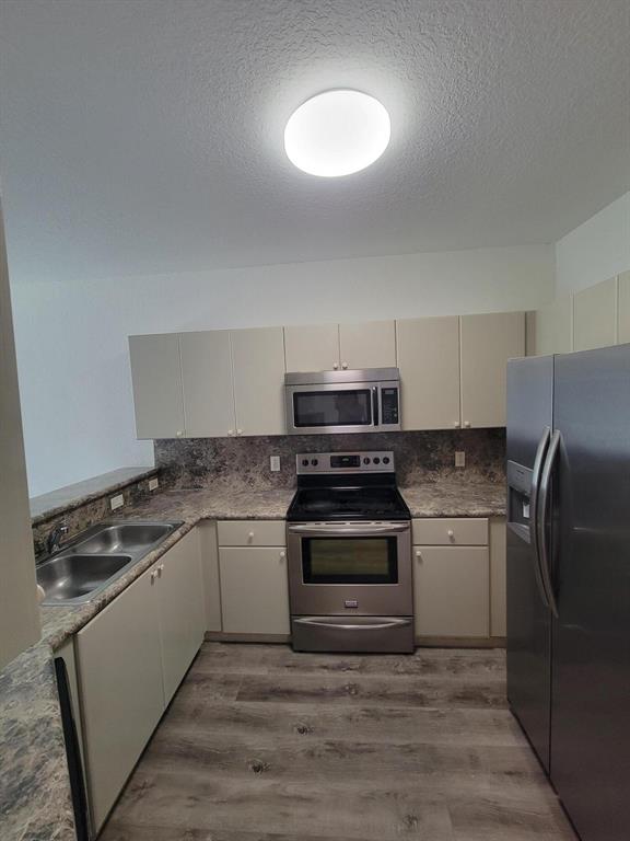 SHOMA VILLAS III AT ROYAL PALM CONDOI - Residential Lease