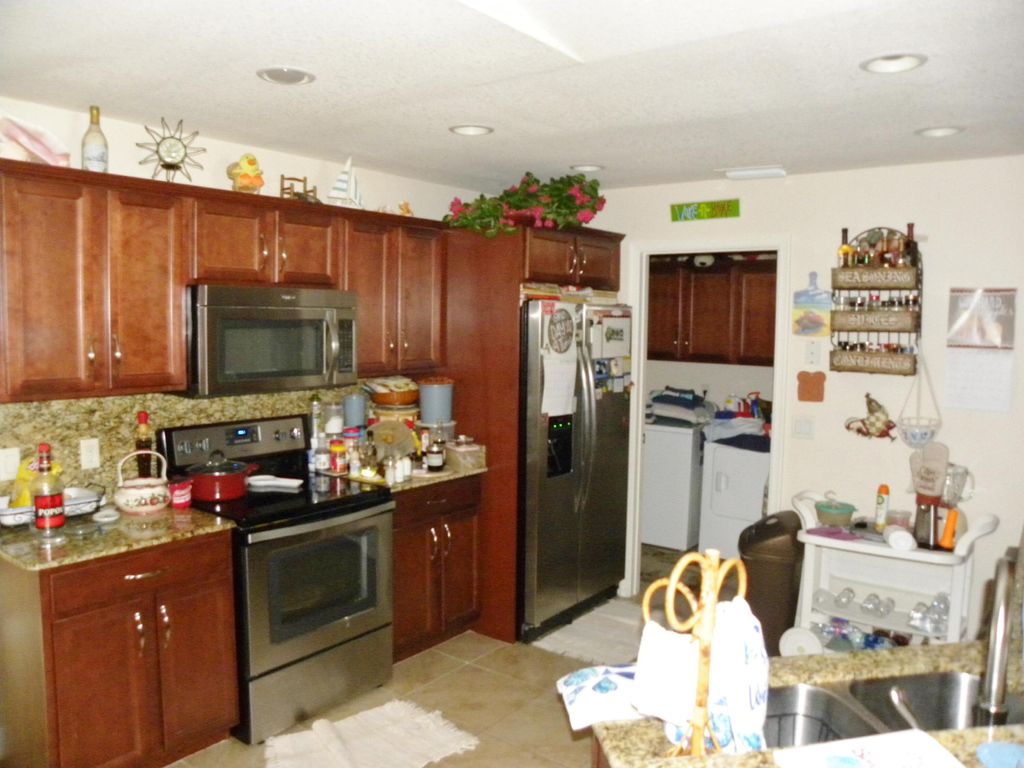 Photo of 14815 Aguila Avenue, Fort Pierce, FL 34951 (MLS # R10972467)