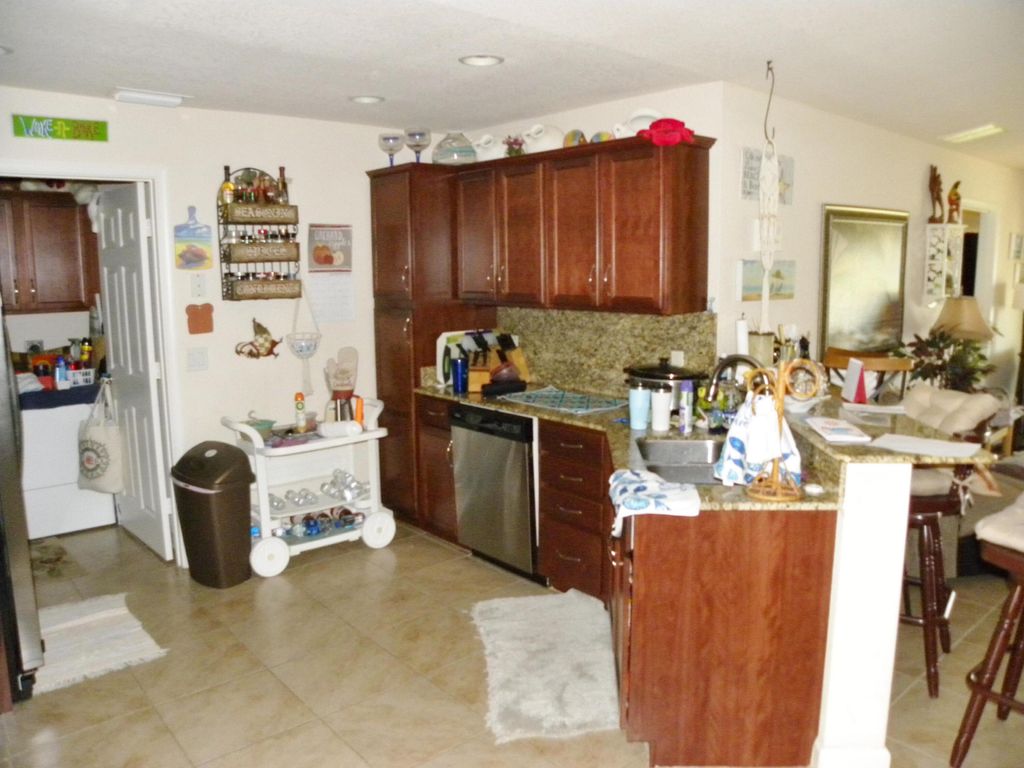 Photo of 14815 Aguila Avenue, Fort Pierce, FL 34951 (MLS # R10972467)