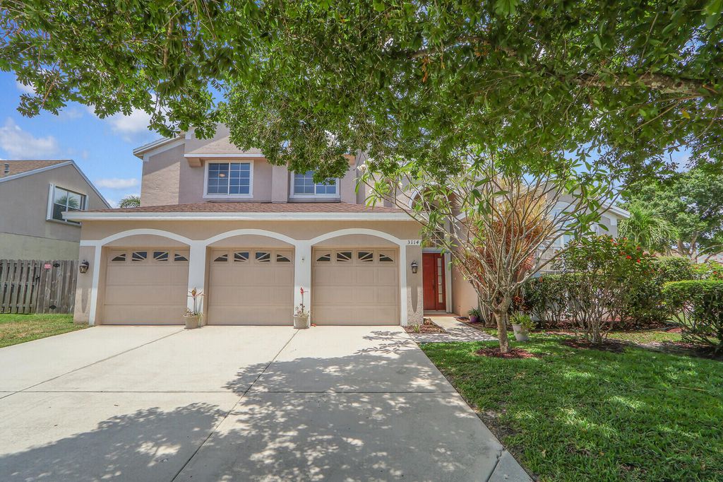 Photo of 3114 SW Marco Lane, Palm City, FL 34990 (MLS # R10986992)