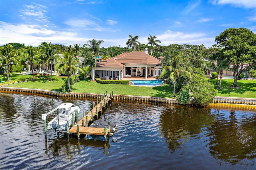 River living at its best!  This home is located on the widest part of the Loxahatchee River in the desirable Tequesta Country Club neighborhood.   Enjoy your own private River Estate in this updated, single story, transitional home that features 4 bedrooms plus a den/office and a  3 car garage.  Marble floors, open kitchen to family room, volume ceilings, split floor plan, screened patio, vanishing edge pool, spacious backyard, dock with lift and so much more!   With all this home offers, it won't last long!