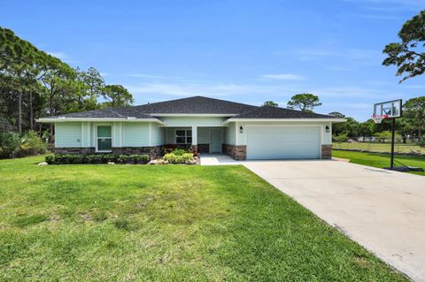 Photo of 5566 Pinetree Drive, Fort Pierce, FL 34982 (MLS # B26024923)